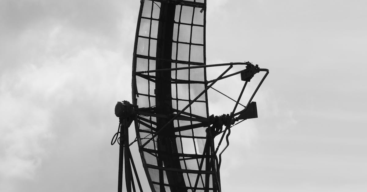 Large radar antenna structure against a cloudy sky